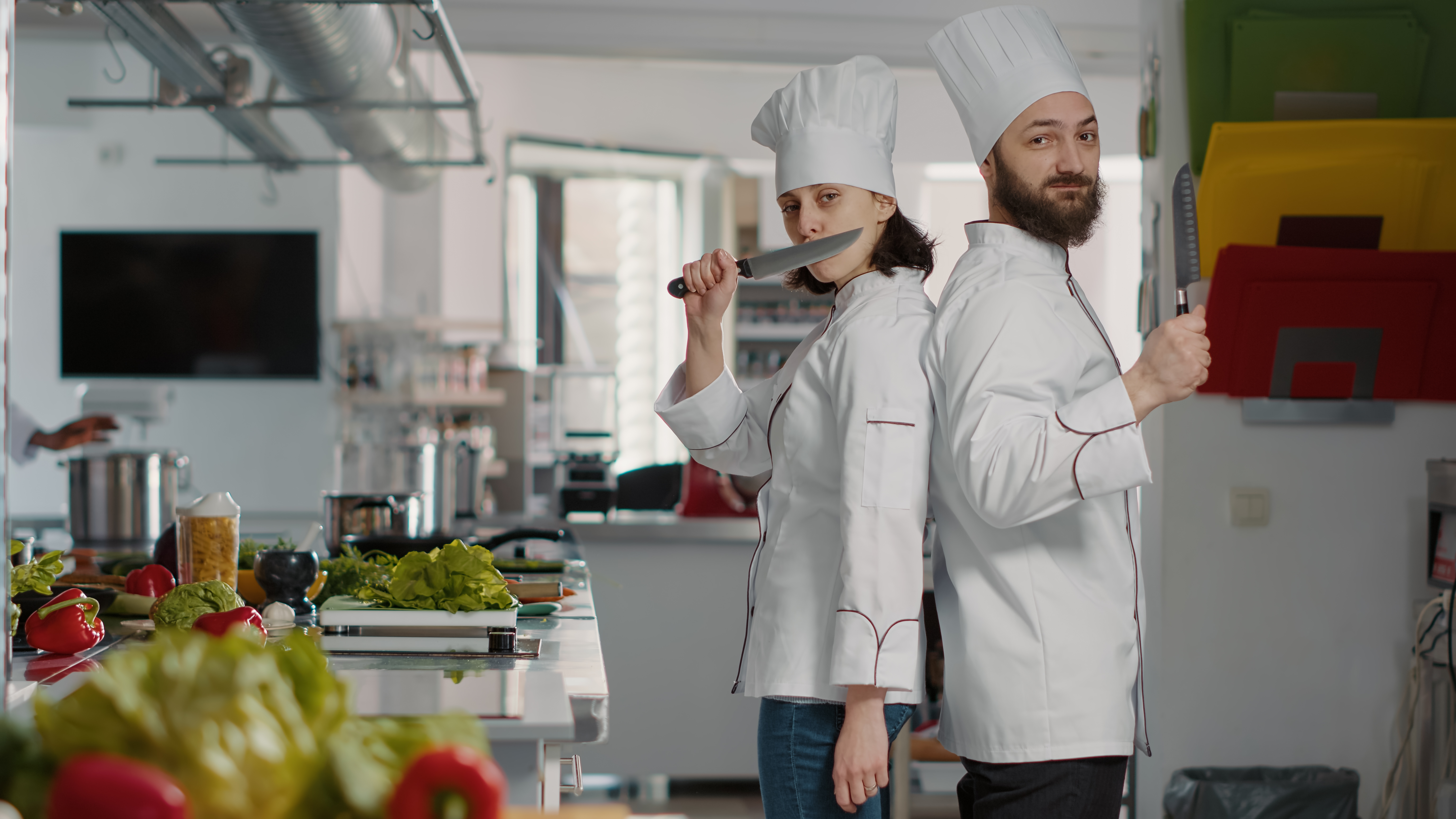 portrait-chefs-team-acting-funny-with-knives-restaurant-kitchen-making-joke-about-professional-cuisine-service-cheerful-man-woman-working-gourmet-meal-dish-with-culinary-recipe “Kadına Ait Bir Oda”: Mutfak